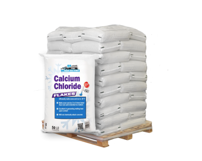 50lb bag of Calcium Chloride Flakes in front of pallet